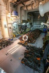 HMAS Darwin seizes large weapons cache